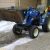 New Holland Tractor Post Hole Digger Loader - Image 1