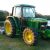 2002 John Deere 6210 Tractor With a Mower - Image 1